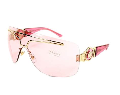 pink tinted versace glasses|Versace rimless glasses.